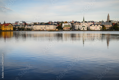 A partial view of downtown Reykjavík, capital city of Iceland, from the banks of Tjörnin lake photo