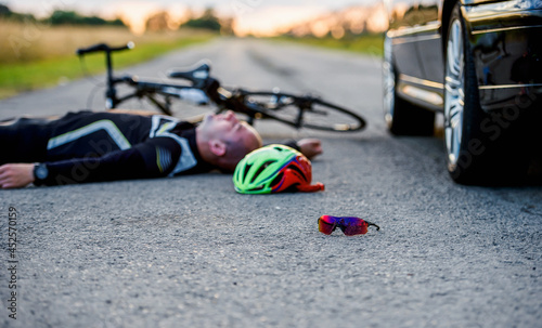 Obraz na plátně Traffic accident between cyclist and a car