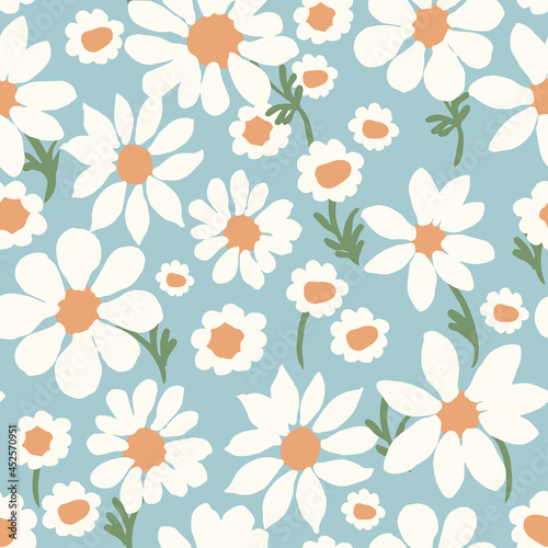 All-over vector seamless repeat pattern with white daisies of different shapes tossed on a modern dusty blue background