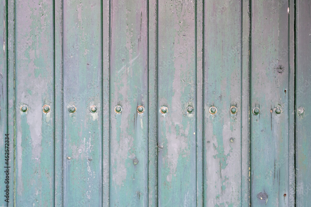 Fototapeta premium green weathered planks with screws attached