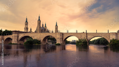 Cathedral Basilica of Our Lady of Pillar with bridge and Ebro river at Zaragoza