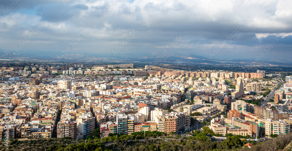 Fototapeta premium panoramic aerial view of Alicante city on a cloudy day 