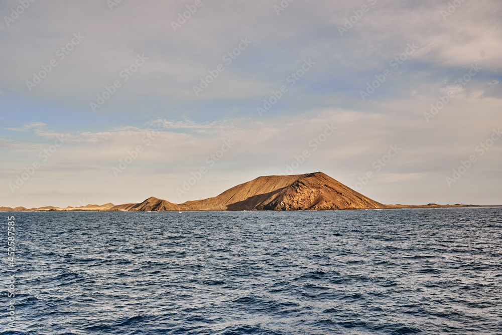 Rippling sea water near mountain Rippling sea water near mountain