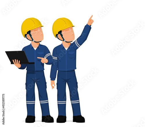 Two workers are looking at high