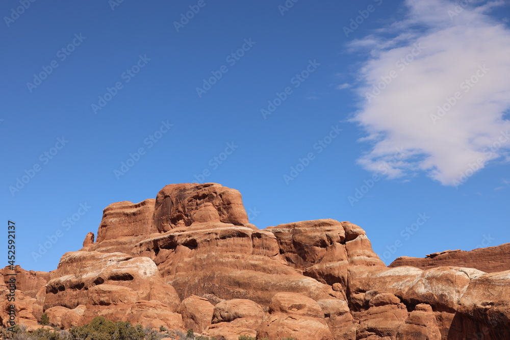 rock formation in Moab with blue sky rock formation in Moab with blue sky