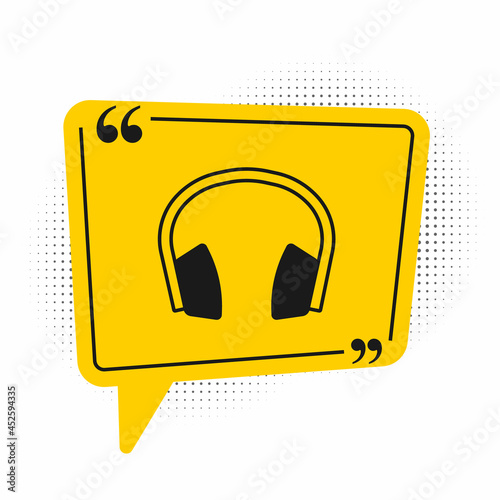 Black Noise canceling headphones icon isolated on white background. Headphones for ear protection from noise. Yellow speech bubble symbol. Vector