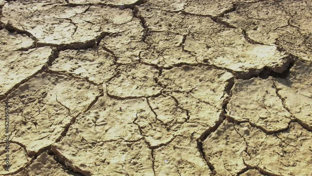 Closeup cracked earth with dry soil Closeup cracked earth with dry soil