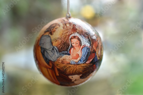 Obraz na plátně Christmas tree toy with the scene of the birth of Jesus Christ