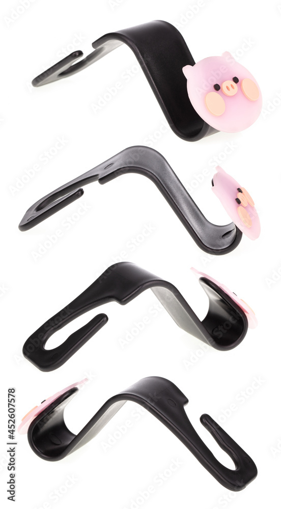 Collection cute plastic wall hanging hooks isolated on a white background. Collection cute plastic wall hanging hooks isolated on a white background.