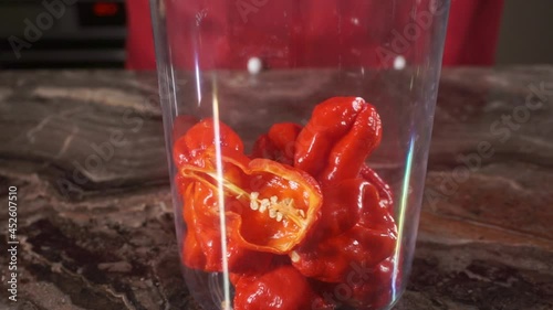 pepper in glass Carolina reaper