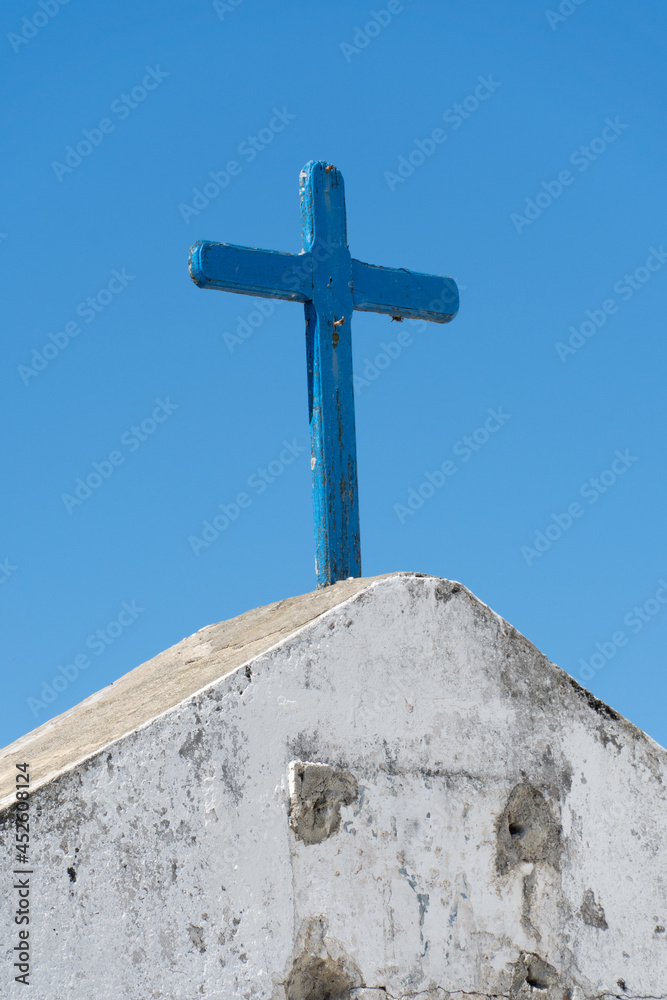 Cross of the Church of Nossa Senhora da Nazaré located in Saquarema, Rio de Janeiro. Sunny day with blue sky in the background Cross of the Church of Nossa Senhora da Nazaré located in Saquarema, Rio de Janeiro. Sunny day with blue sky in the background