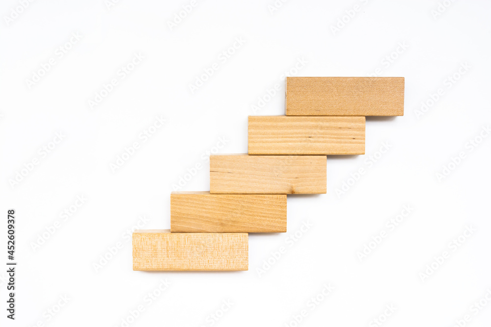 Wood block stacking as step stair. Business concept for growth success process. Wood block stacking as step stair. Business concept for growth success process.