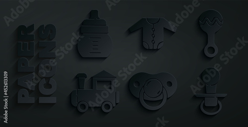 Set Baby dummy pacifier, Rattle baby toy, Toy train, clothes and bottle icon. Vector