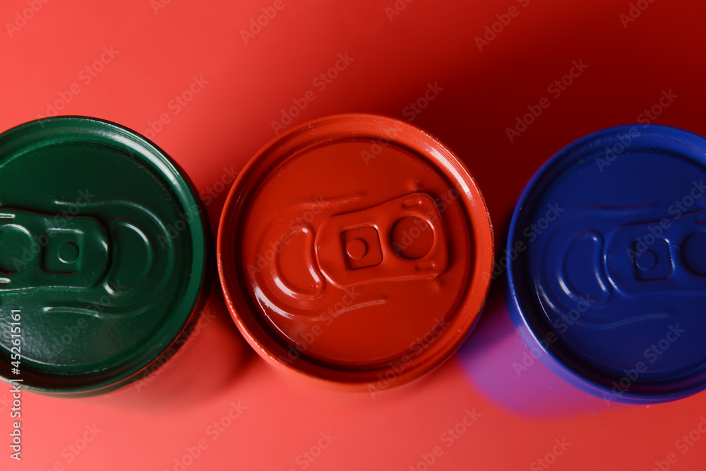 Cans of soda on color background, concept