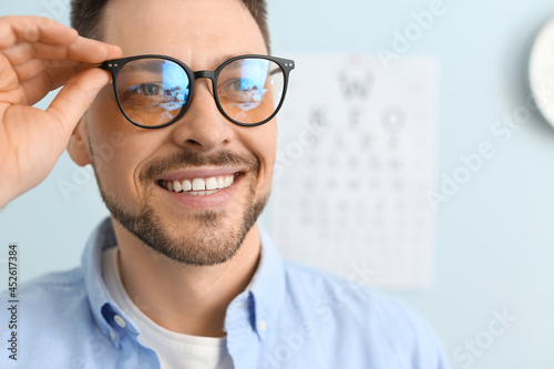 Man with new eyeglasses vis...