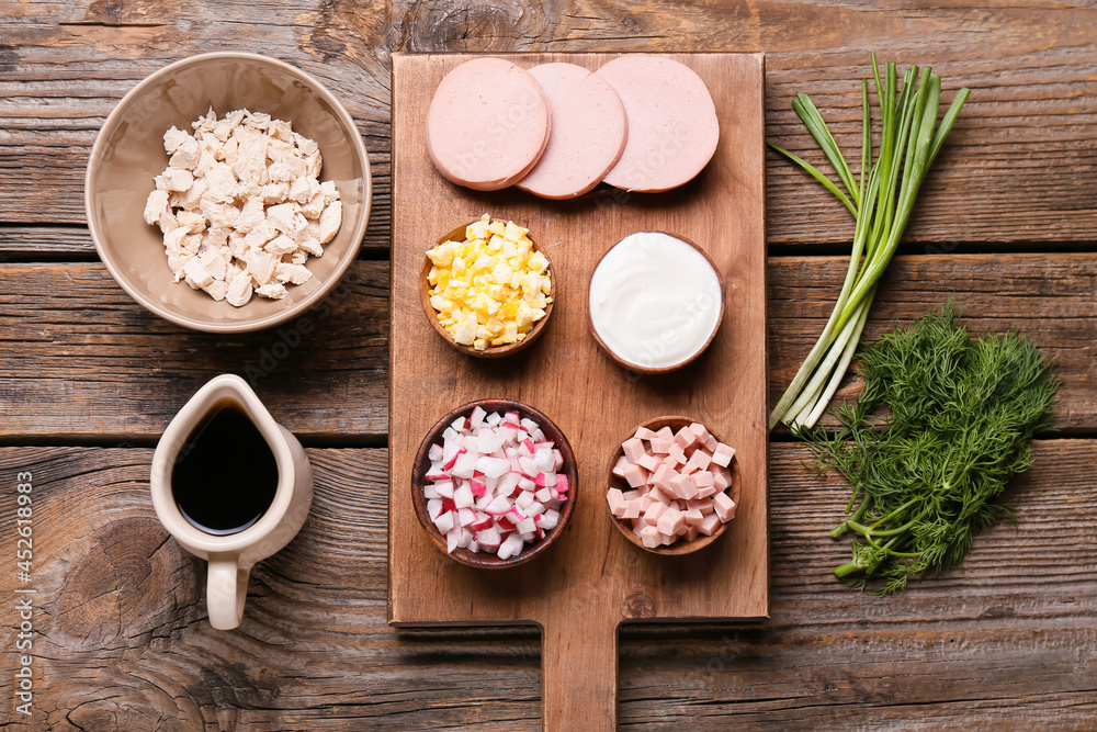 Different ingredients for okroshka on wooden background Different ingredients for okroshka on wooden background