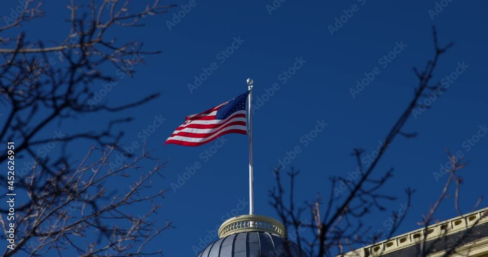 Slow Motion Shot Of National Flag Waning Over Dome Structure On Sunny Day - Aspen, Colorado
