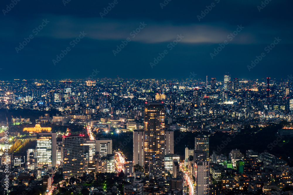 View from above Mori Tower Skydeck of Tokyo metropolis illuminated at night in Roppongi Hill, Minato City, Japan.