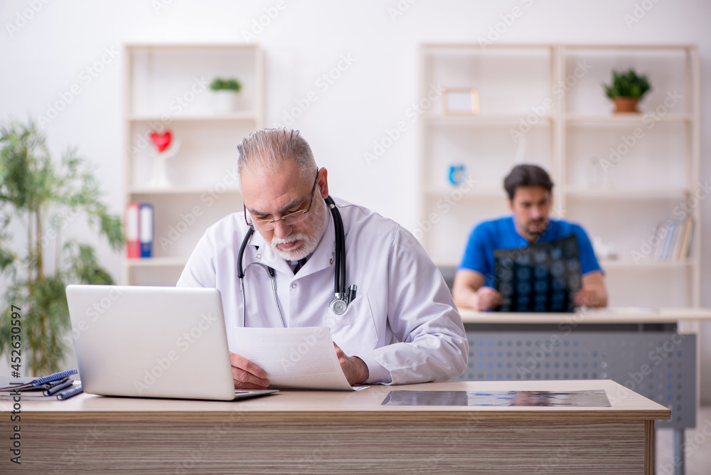 Two male doctors working in the clinic Two male doctors working in the clinic