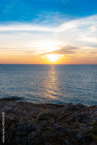Sunset on the sea with views of mountains, Sunset water horizon landscape.