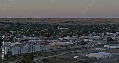 Ogallala Nebraska Aerial v2 pan left shot of rural small town landscape and bright golden sunset - Shot with Inspire 2, X7 camera - August 2020 photo