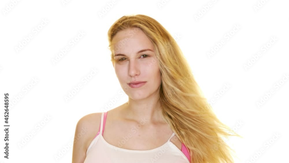A happy lady standing in the wind looking at camera. A woman with a glamour look changing her head position along with her close up eyes for photo shoot. An blond lady standing with elegance. A happy lady standing in the wind looking at camera. A woman with a glamour look changing her head position along with her close up eyes for photo shoot. An blond lady standing with elegance.