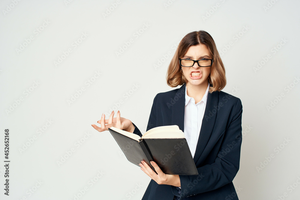Business woman in black jacket documents work isolated background Business woman in black jacket documents work isolated background