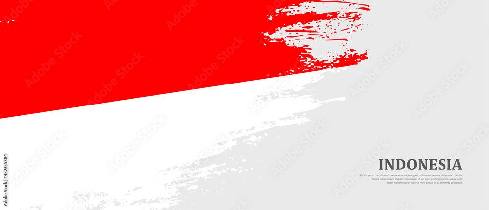 National flag of Indonesia with textured brush flag. Artistic hand drawn brush flag banner background