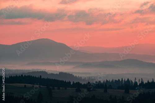 a beautiful landscape with mountains in the morning
