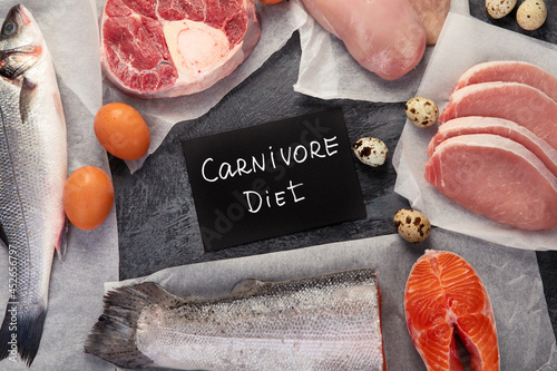 Carnivore diet on dark background.