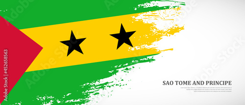 National flag of Sao Tome and Principe with textured brush flag. Artistic hand drawn brush flag banner background