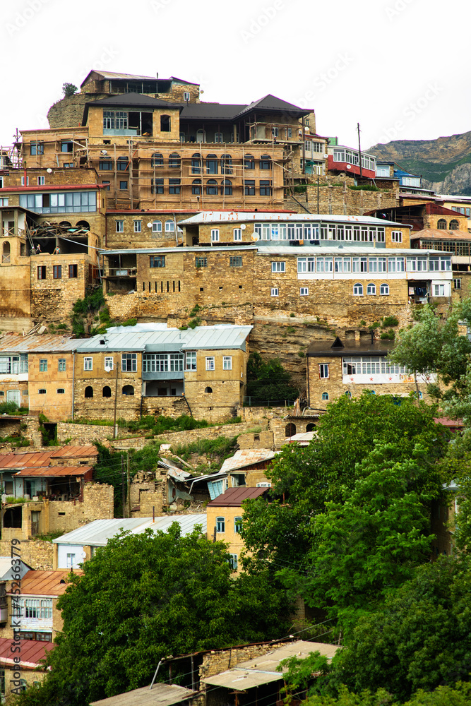 Settlement in the high mountains of Dagestan.A city perched up a mountain of brown stone