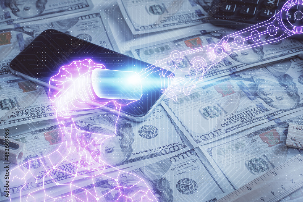 Fototapeta premium Double exposure of man wearing VR glasses drawing over usa dollars bill background. Concept of virtual reality.