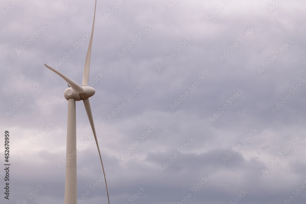 Wind tubing with propeller close up shot with isolated background with sky. Wind turbine isolated with copy space available... Wind tubing with propeller close up shot with isolated background with sky. Wind turbine isolated with copy space available...