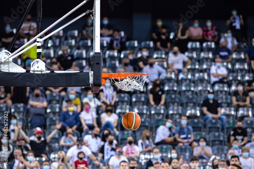 scoring during a basketball game ball in hoop © Melinda Nagy