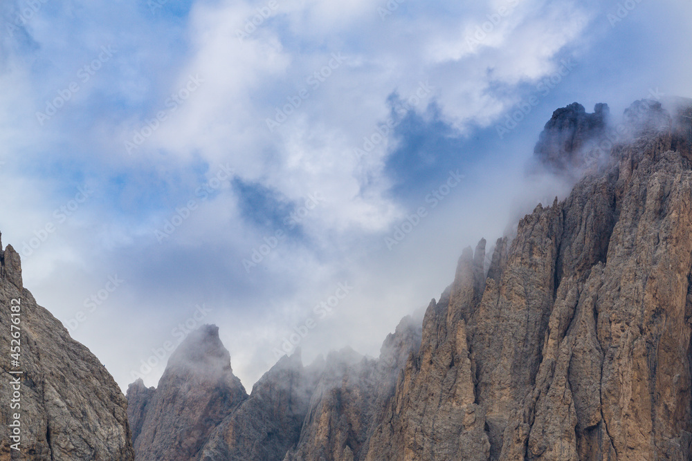 Dramatic sunset clouds in the Dolomite Mountains in summer