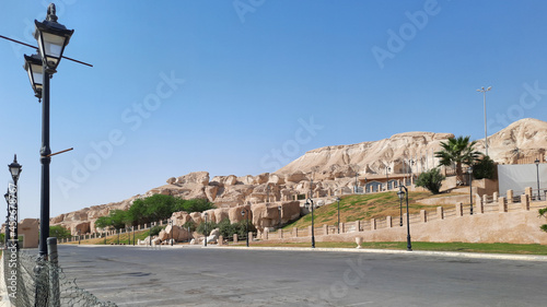 road in the desert and mountain of jabal qara,saudi arabia.  photo