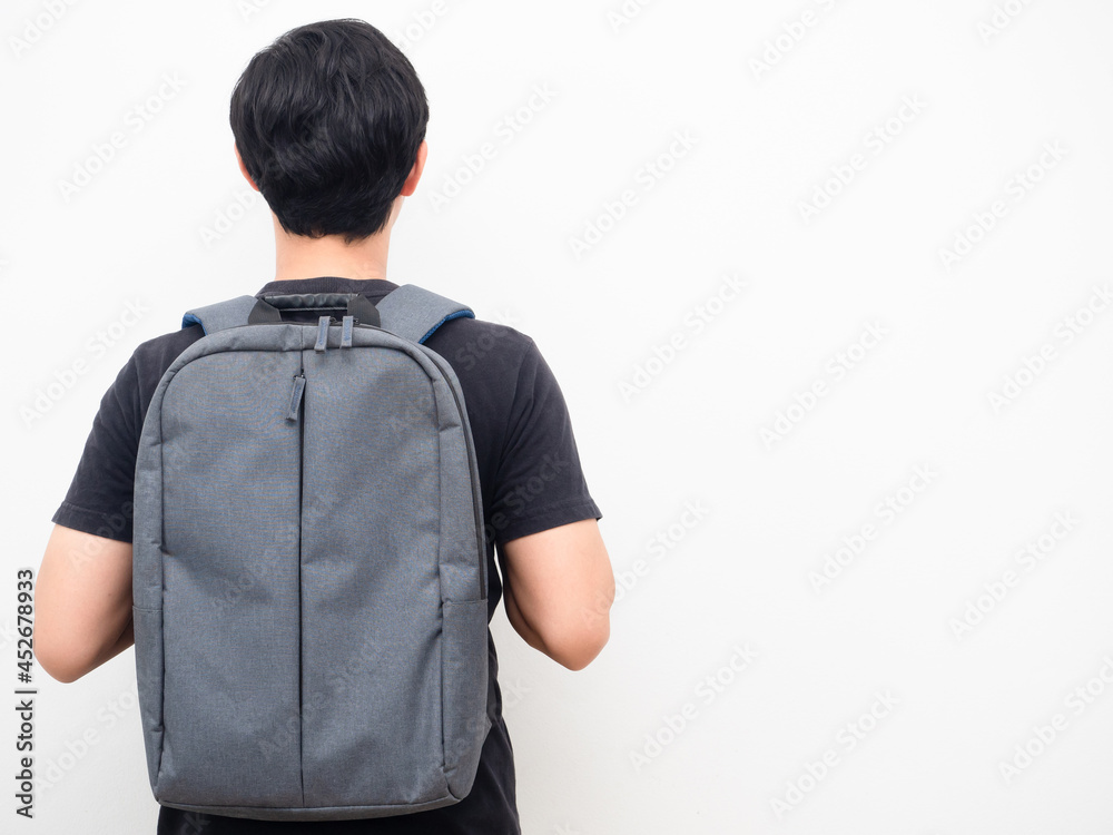 Man with school backpack stand turn back copy space white background back to school concept Man with school backpack stand turn back copy space white background back to school concept