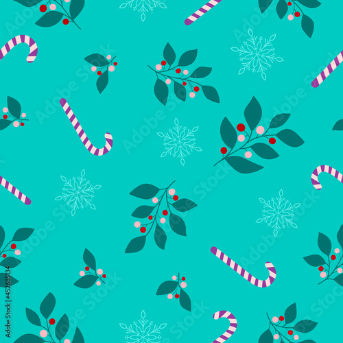 Branches with red and light pink berries  leaves  lolipops  snowflakes on a blue-turquiose background. Seamless winter pattern. Suitable for packaging  textile.