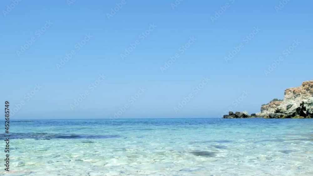 Sea waves splashing on the sea beautiful pebble shore. Travel concept. Video in 4K. Sea waves splashing on the sea beautiful pebble shore. Travel concept. Video in 4K.