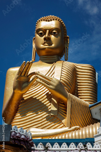 Gold Buddha on roof of Golden Temple, Dambulla, Sri Lanka
