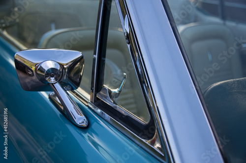 vintage old car closeup of chrome back mirror