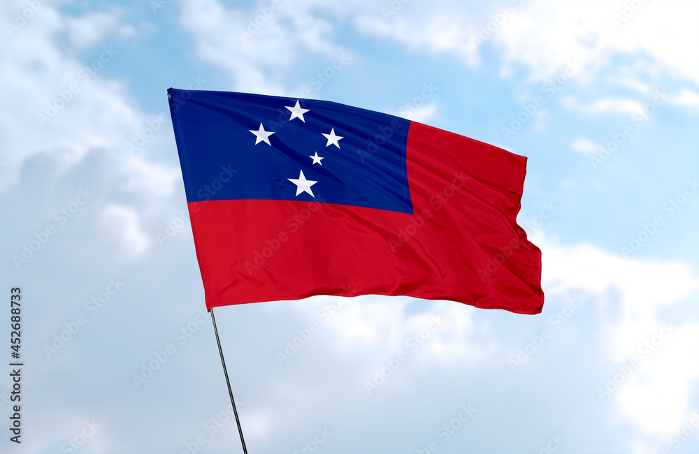 Flag of Samoa, realistic 3d rendering in front of blue sky Flag of Samoa, realistic 3d rendering in front of blue sky