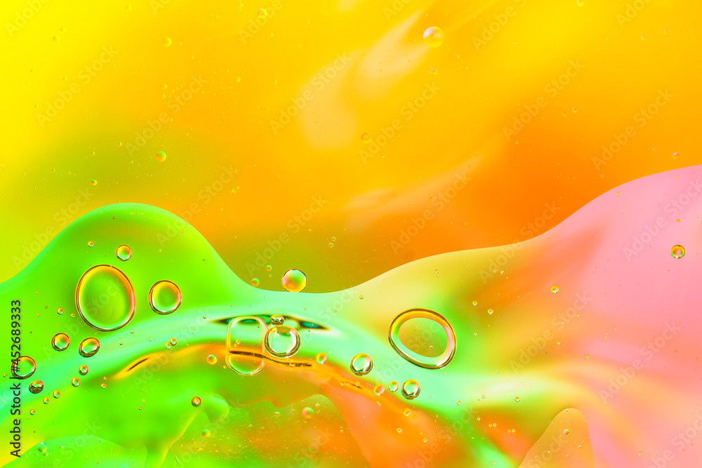 Colorful of oil drop floating on the water.Fantastic structure of colorful oil bubbles Colorful of oil drop floating on the water.Fantastic structure of colorful oil bubbles