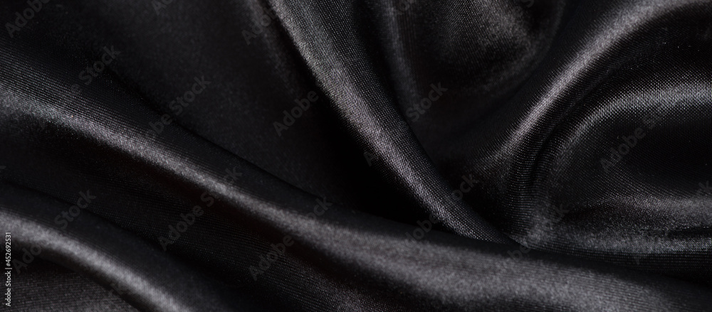 Fototapeta premium Black luxury fabric background with copy space