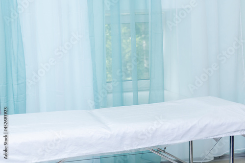 office interior in a health facility with exam table photo