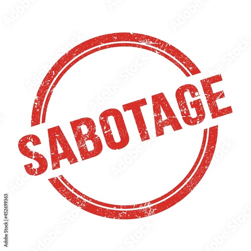 SABOTAGE text written on red grungy round stamp.