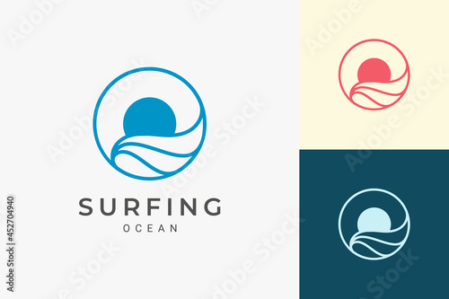 Simple sea or surf logo with ocean wave and sun in circle shape