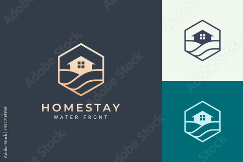 Sea or beach theme real estate logo in simple line and hexagon shape