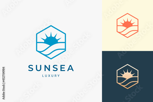 Sun and sea logo in simple and clean hexagon shape